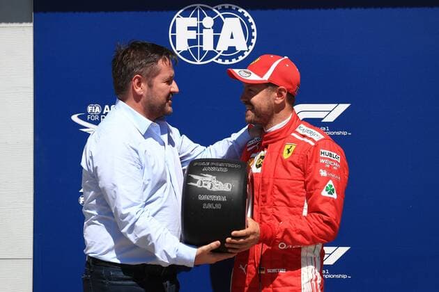 9th June 2018, Circuit Gilles-Villeneuve, Montreal, Canada; Canadian Formula One Grand Prix, qualification; Scuderia Ferrari, Sebastian Vettel takes pole and the pole trophy  ActionPlus12035032 Octane