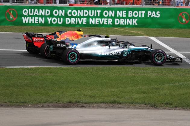 10th June 2018, Circuit Gilles-Villeneuve, Montreal, Canada; Canadian Formula One Grand Prix, race day; Mercedes AMG Petronas Motorsport; Valtteri Bottas and Aston Martin Red Bull Racing TAG Heuer Max Verstappen side by side in first 2 corners  ActionPlus12035538 Octane