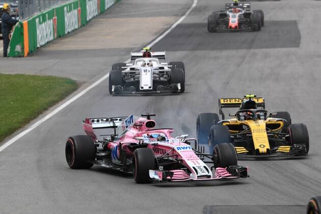 10th June 2018, Circuit Gilles-Villeneuve, Montreal, Canada; Canadian Formula One Grand Prix, race day; Sahara Force India; Sergio Perez and Renault F1 Team, Carlos Sainz  ActionPlus12035552 Octane