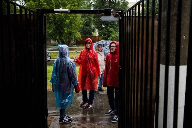 180612 Volunteers are seen in the heavy rain prior team Mexico practice session ahead of the 2018 FIFA World Cup on June 12 2018 in Moscow Photo Petter Arvidson BILDBYR N Code PA 92060  Copyright: PETTERxARVIDSON BB180612PA058
