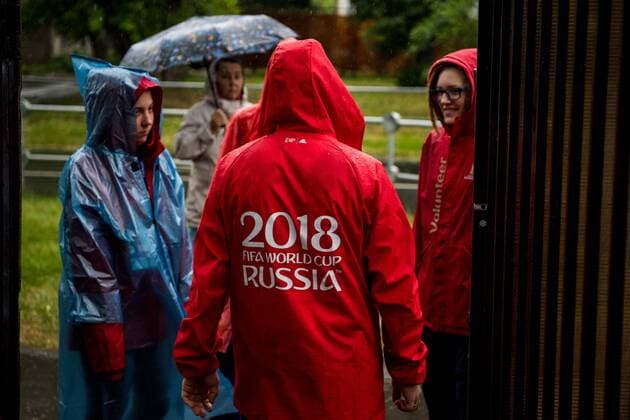180612 Volunteers are seen in the heavy rain prior team Mexico practice session ahead of the 2018 FIFA World Cup on June 12 2018 in Moscow Photo Petter Arvidson BILDBYR N Code PA 92060  Copyright: PETTERxARVIDSON BB180612PA059