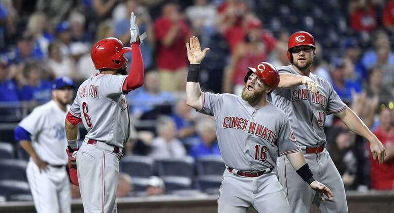 June 12, 2018 - Kansas City, MO, USA - The Cincinnati Reds Billy Hamilton, Tucker Barnhart and Scott Schebler celebrate after scoring on a triple by Joey Votto in the 10th inning against the Kansas City Royals on Tuesday, June 12, 2018, at Kauffman Stadium in Kansas City, Mo. The Reds won, 5-1, in 10 innings. Cincinnati at Kansas City - ZUMAm67_ 20180612_zaf_m67_097 Copyright: xJohnxSleezerx