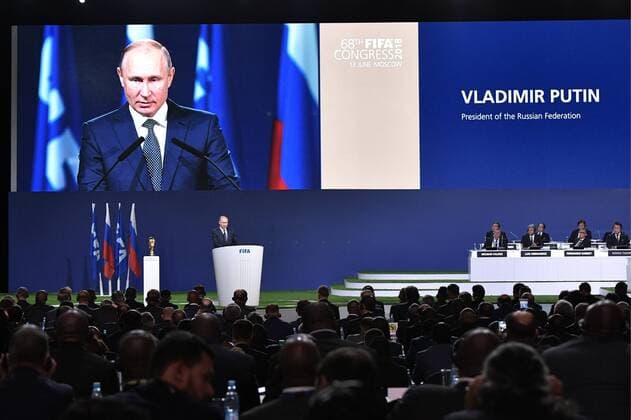 MOSCOW, RUSSIA - JUNE 13, 2018: Russia s President Vladimir Putin (C) takes part in the 68th FIFA Congress at the Expocentre. Alexei Nikolsky Russian Presidential Press and Information Office TASS  TS083CAC