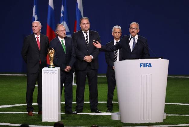 (180613) -- MOSCOW, June 13, 2018 -- The president of the United States Soccer Federation Carlos Cordeiro (1st R) delivers a speech after winning the joint bid to host the 2026 football World Cup in Moscow, Russia, on June 13, 2018. Canada, Mexico and the United States will jointly host the 2026 football World Cup after beating a rival bid from Morocco in a vote at the 68th FIFA Congress in Moscow on Wednesday. ) (SP)RUSSIA-MOSCOW-2026 FIFA World Cup WM Weltmeisterschaft Fussball HOST NATIONS XuxZijian 