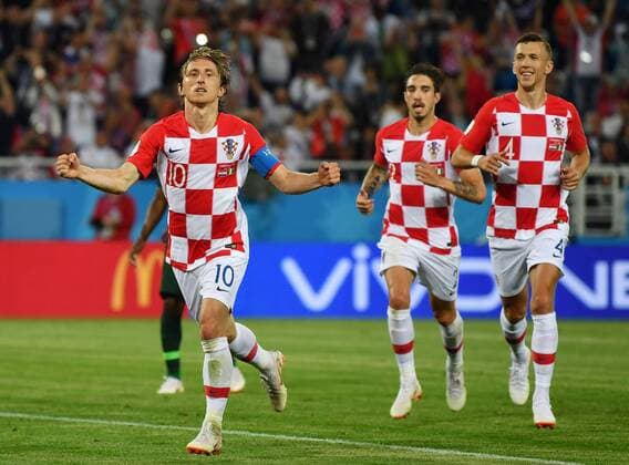 (180616) -- KALININGRAD, June 16, 2018 -- Luka Modric (L) of Croatia celebrates scoring with teammates during a group D match between Croatia and Nigeria at the 2018 FIFA World Cup WM Weltmeisterschaft Fussball in Kaliningrad, Russia, June 16, 2018. ) (SP)RUSSIA-KALININGRAD-2018 WORLD CUP-GROUP D-CROATIA VS NIGERIA ChenxCheng 