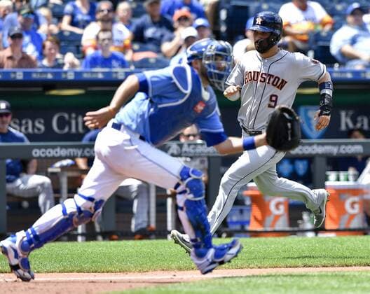 June 16, 2018 - Kansas City, MO, USA - The Houston Astros Marwin Gonzalez (9) heads for home past Kansas City Royals catcher Drew Butera on a double by Jake Marisnick in the fifth inning at Kauffman Stadium in Kansas City, Mo., on Saturday, June 16, 2018. The Astros won, 10-2. Houston at Kansas City - ZUMAm67_ 20180616_zaf_m67_005 Copyright: xJohnxSleezerx