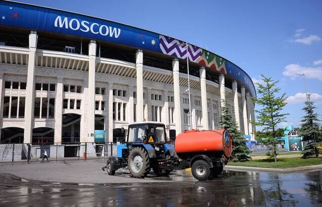 FIFA World Cup 2018 Preliminary Round Group F 17 06 2018 Germany Mexico Street cleaning a tractor distributes water in front of the Luschniki Stadium