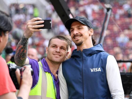 FIFA World Cup 2018 Preliminary Round Group F 17 06 2018 Germany Mexico A folder makes a selfi with Zlatan Ibrahimovic Sweden, who is ambassador for the FIFA sponsor VISA in the Luschniki Stadium