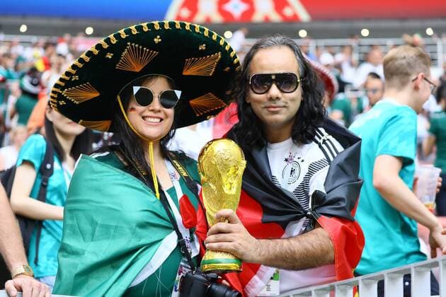 German and Mexican fans celebrate together peacefully at the World Cup 17 06 2018 Germany vs Mexico Luschniki Stadium Moscow