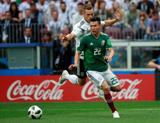 Mexican forward Hirving Lozano (R) and German defender Joshua Kimmich during the FIFA World Cup WM Weltmeisterschaft Fussball 2018 Group F soccer match between Germany and Mexico, in Moscow, Russia, 17 June 2018. GERMANY VS. MEXICO !ACHTUNG: NUR REDAKTIONELLE NUTZUNG!  Copyright: xJosexMendezx FWC09-65 20180617-636648519408407032
