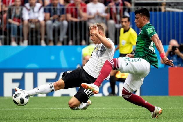 180617 Joshua Kimmich of Germany and Jesus Gallardo of Mexico during the FIFA World Cup group stage match between Germany and Mexico on June 17, 2018 in Moscow Photo Petter Arvidson BILDBYRAN Code PA 92069  Copyright: PETTERxARVIDSON BB180617PA045
