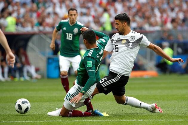 Mexican defender Hugo Ayala (L) and German midfielder Sami Khedira during the FIFA World Cup WM Weltmeisterschaft Fussball 2018 Group F soccer match between Germany and Mexico, in Moscow, Russia, 17 June 2018. GERMANY VS. MEXICO !ACHTUNG: NUR REDAKTIONELLE NUTZUNG!  Copyright: xAlbertoxEstevezx FWC09-78 20180617-636648525659503794