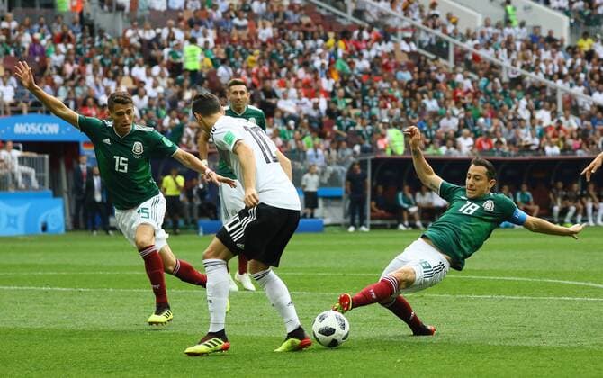 Andres Guardado Mexico Mexico takes the ball from Mesut Oezil Germany Germany 17 06 2018 Germany vs Mexico Luschniki Stadium Moscow