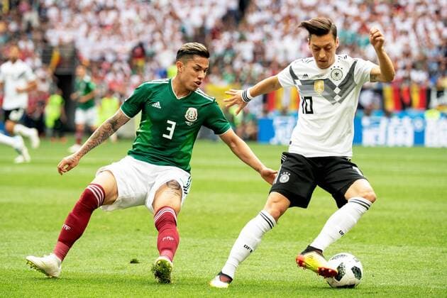 180617 Carlos Salcedo of Mexico and Mesut Özil of Germany during the FIFA World Cup group stage match between Germany and Mexico on June 17, 2018 in Moscow Photo Petter Arvidson BILDBYRAN Code PA 92069  Copyright: PETTERxARVIDSON BB180617PA049