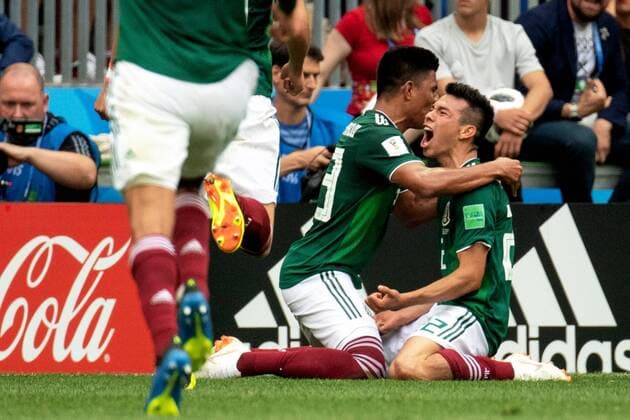 180617 Hirving Lozano of Mexico celebrates with his teammates after scoring 0 1 during the FIFA World Cup group stage match between Germany and Mexico on June 17, 2018 in Moscow Photo Petter Arvidson BILDBYRAN Code PA 92069  Copyright: PETTERxARVIDSON BB180617PA056