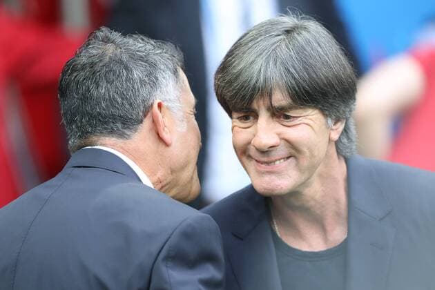(180617) -- MOSCOW, June 17, 2018 -- Head coach Joachim Loew (R) of Germany greets head coach Juan Carlos Osorio of Mexico prior to a group F match between Germany and Mexico at the 2018 FIFA World Cup WM Weltmeisterschaft Fussball in Moscow, Russia, June 17, 2018. ) (SP)RUSSIA-MOSCOW-2018 WORLD CUP-GROUP F-GERMANY VS MEXICO XuxZijian 