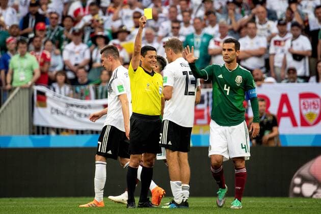 180617 Thomas Müller of Germany has been shown a yellow card by referee Alireza Faghani during the FIFA World Cup group stage match between Germany and Mexico on June 17, 2018 in Moscow Photo Petter Arvidson BILDBYRAN Code PA 92069  Copyright: PETTERxARVIDSON BB180617PA072