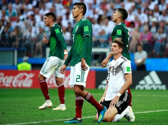 Mexican defender Hugo Ayala (C) and German forward Mario Gomez (R) during the FIFA World Cup WM Weltmeisterschaft Fussball 2018 Group F soccer match between Germany and Mexico, in Moscow, Russia, 17 June 2018. GERMANY VS. MEXICO !ACHTUNG: NUR REDAKTIONELLE NUTZUNG!  Copyright: xJosexMendezx FWC09-164 20180617-636648586573209730