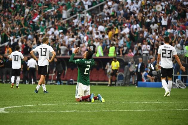 Soccer Mens Season 2017 18 World Championship in Russia Group F 1 Gameday Luschniki Stadium Moscow Germany Mexico Cheers after the final whistle Hugo Ayala No. 2 Mexico kneels in thanksgiving on the grass Mesut Ösil Nr 10 Germany Thomas Müller No. 13 Germany and Mario Gomez No. 23 Germany leave disappointed Place 17 06 2018 Copyright: xMatthiasxKochx
