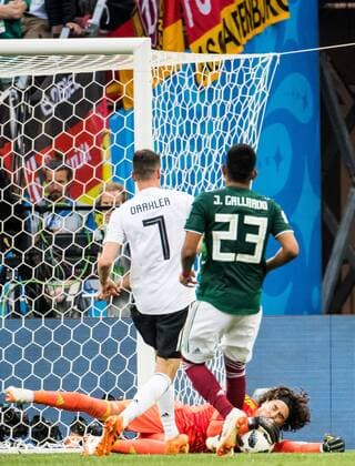 180617 Goalkeeper Guillermo Ochoa of Mexico saves from Julian Draxler of Germany during the FIFA World Cup group stage match between Germany and Mexico on June 17, 2018 in Moscow Photo Petter Arvidson BILDBYRAN Code PA 92069  Copyright: PETTERxARVIDSON BB180617PA140