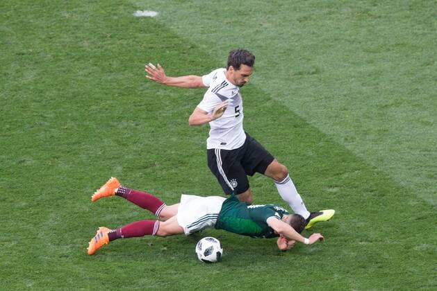 June 17, 2018 - Moscow, Russia - Javier Hernandez of Mexico vies Mats Hummels of Germany during the Russia 2018 World Cup Group F football match between Germany and Mexico at the Luzhniki Stadium in Moscow on June 17, 2018. Germany v Mexico: Group F - 2018 FIFA World Cup WM Weltmeisterschaft Fussball Russia  - ZUMAn230 20180617_zaa_n230_742 Copyright: xFotoxOlimpikx