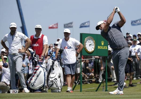 Brooks Koepka hits his tee shot on the first hole in the final round at the 118th U.S. Open Championship at Shinnecock Hills Golf Club in Southampton, New York on June 17, 2018.  NYP20180617115 JOHNxANGELILLO