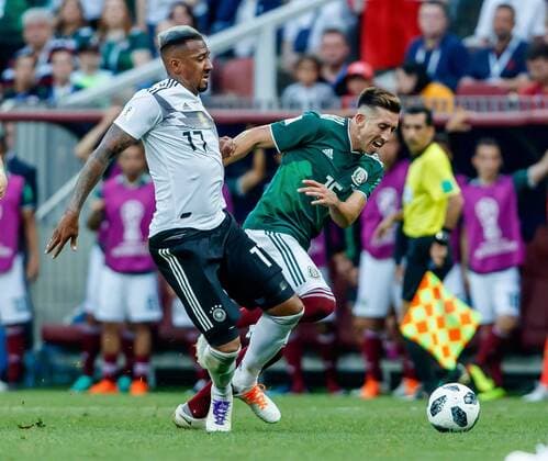 Moscow Russia 17 06 2018 FIFA World Cup Group F Germany Mexico Jerome Boateng GER and Hector Herrera MEX in a duel DeFodi507