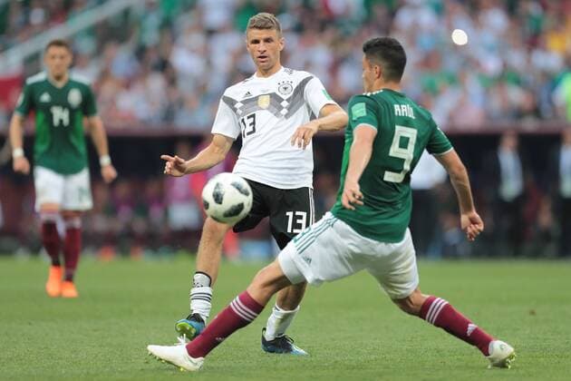 June 17, 2018 - Moscow, Russia - midfielder Thomas Mueller of Germany national team Nationalteam and forward Raul Jimenez of Mexico National team during a Group F 2018 FIFA World Cup WM Weltmeisterschaft Fussball soccer match between Germany and Mexico on June 16, 2018, at the Kazan Arena in Kazan, Russia. Germany v Mexico: Group F - 2018 FIFA World Cup Russia  - ZUMAn230 20180617_zaa_n230_862 Copyright: xAnatolijxMedvedx