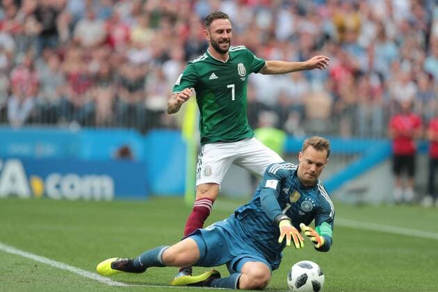 KAZAN, RUSSIA - JUNE 17: goalkeeper Manuel Neuer of Germany and midfielder Miguel Layun of Mexico during a Group F 2018 FIFA World Cup WM Weltmeisterschaft Fussball soccer match between Germany and Mexico on June 16, 2018, at Kazan Arena in Kazan, Russia. (Photo by Anatoliy Medved Icon Sportswire) SOCCER: JUN 17 FIFA World Cup Group Stage - Germany v Mexico Icon180617014 EDITORIAL USE ONLY
