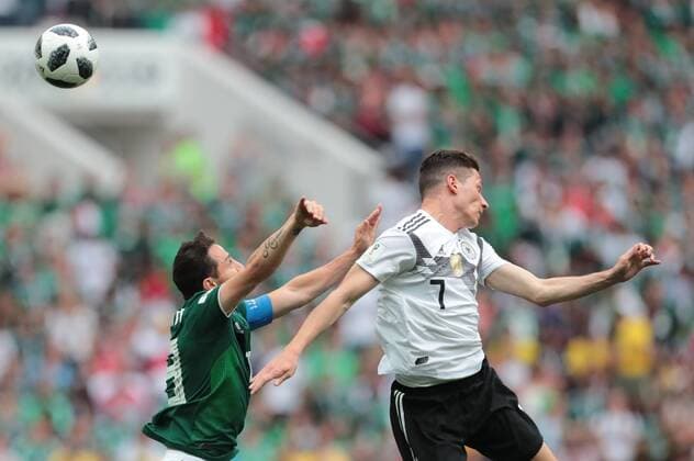 KAZAN, RUSSIA - JUNE 17: forward Marco Fabian of Mexico and midfielder Julian Draxler of Germany during a Group F 2018 FIFA World Cup WM Weltmeisterschaft Fussball soccer match between Germany and Mexico on June 16, 2018, at Kazan Arena in Kazan, Russia. (Photo by Anatoliy Medved Icon Sportswire) SOCCER: JUN 17 FIFA World Cup Group Stage - Germany v Mexico Icon180617027 EDITORIAL USE ONLY