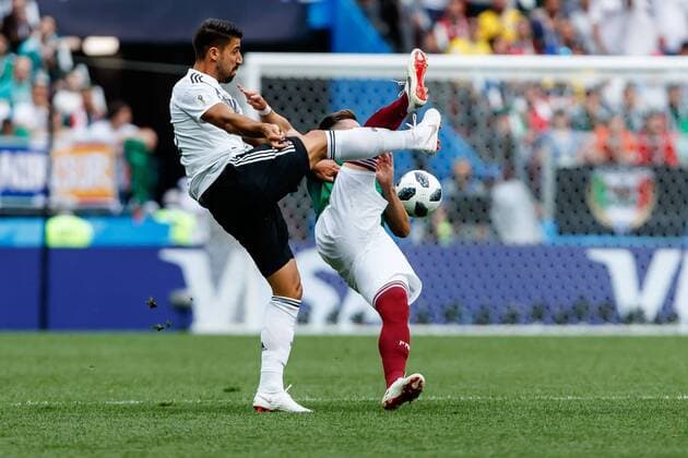 Moscow Russia 17 06 2018 FIFA World Cup Group F Germany Mexico Hector Herrera MEX and Sami Khedira GER in a duel DeFodi507
