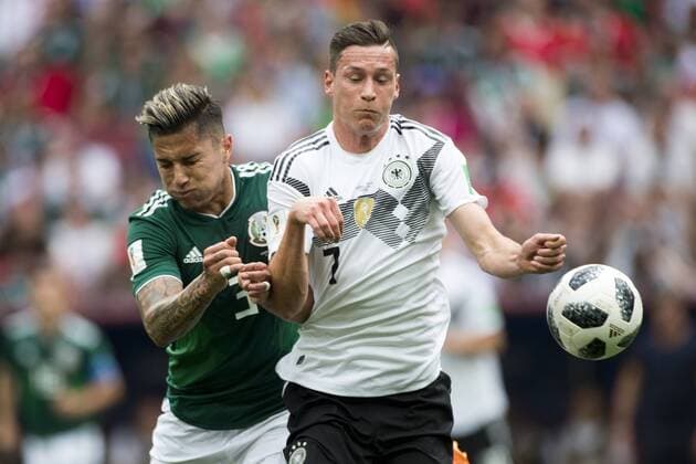 June 17, 2018 - Moscow, Russia - Carlos Salcedo of Mexico and Julian Draxler of Germany during the 2018 FIFA World Cup WM Weltmeisterschaft Fussball Russia Group F match between Germany and Mexico at Luzhniki Stadium in Moscow, Russia on June 17, 2018 Germany v Mexico : Group F - 2018 FIFA World Cup Russia  - ZUMAn230 20180617_zaa_n230_1029 Copyright: xAndrewxSurmax