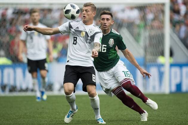 June 17, 2018 - Moscow, Russia - Toni Kroos of Germany and Hector Herrera of Mexico during the 2018 FIFA World Cup WM Weltmeisterschaft Fussball Russia Group F match between Germany and Mexico at Luzhniki Stadium in Moscow, Russia on June 17, 2018 Germany v Mexico : Group F - 2018 FIFA World Cup Russia  - ZUMAn230 20180617_zaa_n230_1036 Copyright: xAndrewxSurmax