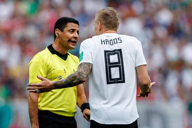 Moscow Russia 17 06 2018 FIFA World Cup Group F Germany Mexico referee Alireza Faghani and Toni Kroos GER discussion DeFodi507