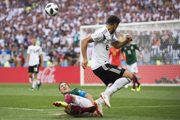 June 17, 2018 - Moscow, Russia - Andres Guardado of Mexico and Sami Khedira of Germany during the 2018 FIFA World Cup WM Weltmeisterschaft Fussball Russia Group F match between Germany and Mexico at Luzhniki Stadium in Moscow, Russia on June 17, 2018 Germany v Mexico : Group F - 2018 FIFA World Cup Russia  - ZUMAn230 20180617_zaa_n230_1055 Copyright: xAndrewxSurmax