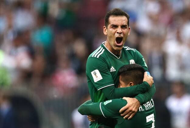 MOSCOW, RUSSIA - JUNE 17, 2018: Mexico s Rafael Marquez (L) and Hugo Ayala celebrate their victory in the 2018 FIFA World Cup WM Weltmeisterschaft Fussball Group F football match against Germany at Luzhniki Stadium. Mexico won the game 1-0. Valery Sharifulin TASS  TS084D2C