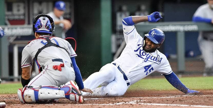 June 18, 2018 - Kansas City, MO, USA - Kansas City Royals Abraham Almonte scores in front of Texas Rangers catcher Robinson Chirinos on a double by Adalberto Mondesi in the third inning during Monday s baseball game on June 18, 2018, at Kauffman Stadium in Kansas City, Mo. Rangers vs Royals - ZUMAm67_ 20180618_zaf_m67_007 Copyright: xJohnxSleezerx