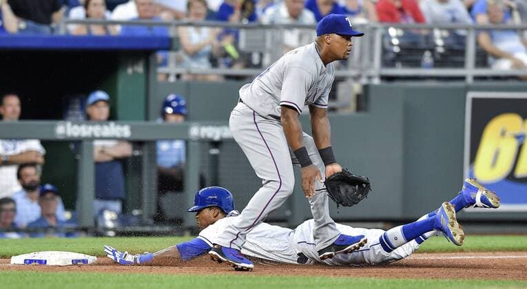 June 18, 2018 - Kansas City, MO, USA - Kansas City Royals Rosell Herrera slides into third on an RBI triple past Texas Rangers third baseman Adrian Beltre in the fourth inning during Monday s baseball game on June 18, 2018, at Kauffman Stadium in Kansas City, Mo. Rangers vs Royals - ZUMAm67_ 20180618_zaf_m67_012 Copyright: xJohnxSleezerx