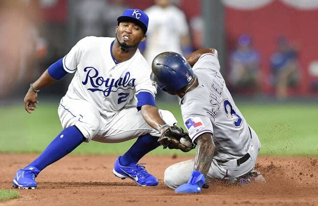June 18, 2018 - Kansas City, MO, USA - Kansas City Royals shortstop Alcides Escobar tags out Texas Rangers Delino DeShields trying to steal second in the seventh inning during Monday s baseball game on June 18, 2018, at Kauffman Stadium in Kansas City, Mo. Rangers vs Royals - ZUMAm67_ 20180618_zaf_m67_014 Copyright: xJohnxSleezerx