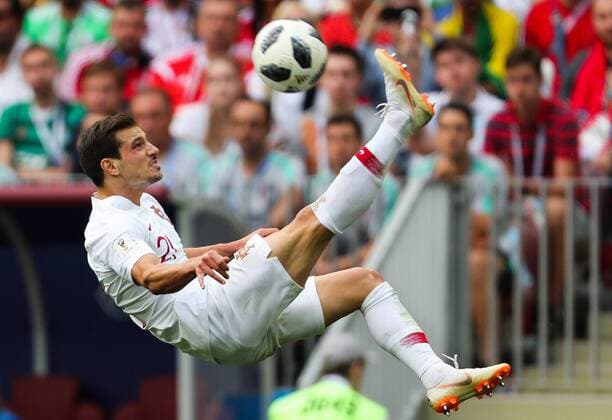 Bilder des Tages - SPORT MOSCOW, RUSSIA â€“ JUNE 20, 2018: Portugal s Cedric Soares licks the ball in their 2018 FIFA World Cup WM Weltmeisterschaft Fussball Group B Round 2 football match against Morocco at Luzhniki Stadium. Portugal won the game 1:0. Mikhail Tereshchenko TASS  TS085566