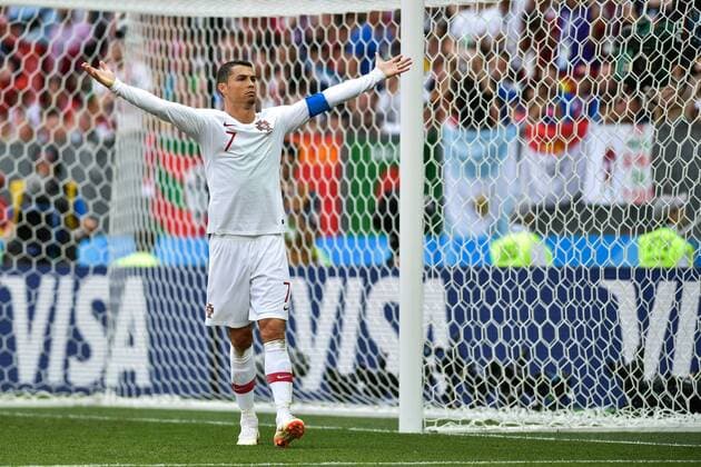 Cristiano Ronaldo of Portugal celebrates with after defeating Morocco in their Group B match during the 2018 FIFA World Cup WM Weltmeisterschaft Fussball in Moscow, Russia, 20 June 2018. Cristiano Ronaldo powered-home a fourth-minute header to give Portugal a 1-0 World Cup victory over Morocco that took it top of Group B on and meant the unlucky North African side become the first to be eliminated from the tournament. Ronaldo s fourth goal of Russia 2018, following his hat-trick in the 3-3 draw with Spain, took the European champions to four points. Iran has three points and Spain one ahead of their meeting later. Morocco, who had a real go at the Luzhniki Stadium but failed to convert their chances, are pointless having also lost 1-0 to Iran and cannot progress to the second round. Cristiano Ronaldo goal sees Portugal eliminate Morocco from Russia 2018  20180620_10254