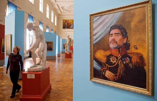 ST PETERSBURG, RUSSIA â€“ JUNE 21, 2018: Portrait of retired Argentine footballer Diego Maradona by Italian artist Fabrizio Birimbelli on display at the Like the Gods exhibition featuring paintings of football stars in historical uniforms at the Museum of the Russian Academy of Arts during the 2018 FIFA World Cup WM Weltmeisterschaft Fussball Alexander Demianchuk TASS  83927463st