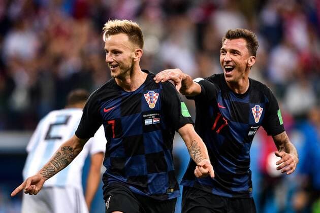 Ivan Rakitic, left, and Mario Mandzukic of Croatia celebrate after defeating Argentina in their Group D match during the 2018 FIFA World Cup WM Weltmeisterschaft Fussball in Nizhny Novgorod, Russia, 21 June 2018.  20180622_82130