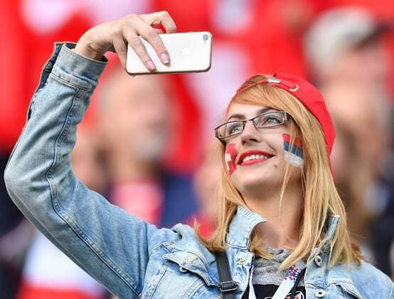 (180622) -- KALININGRAD, June 22, 2018 -- A fan takes a selfie prior to the 2018 FIFA World Cup WM Weltmeisterschaft Fussball Group E match between Switzerland and Serbia in Kaliningrad, Russia, June 22, 2018. ) (SP)RUSSIA-KALININGRAD-2018 WORLD CUP-GROUP E-SWITZERLAND VS SERBIA LiuxDawei 