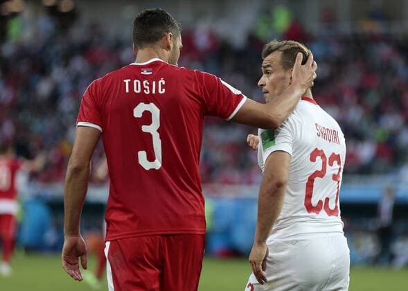 WM 2018, Serbien - Schweiz KALININGRAD, RUSSIA - JUNE 22, 2018: Serbia s Dusko Tosic (3) and Switzerland s Xherdan Shaqiri in a First Stage Group E football match between Serbia and Switzerland at Kaliningrad Stadium (Baltika Arena) at FIFA World Cup WM Weltmeisterschaft Fussball Russia 2018; Switzerland won 2-1. Denis Tyrin TASS  TS085D13