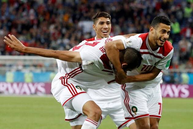 Bilder des Tages SPORT Moroccan players jubilate Khalid Boutaib s (L) 0-1 during the FIFA World Cup WM Weltmeisterschaft Fussball Russia 2018 Group B match between Spain and Morocco, at the Kaliningrad stadium in Kaliningrad, Russia, 25 June 2018. Group B Spain vs. Morocco !ACHTUNG: NUR REDAKTIONELLE NUTZUNG!  Copyright: xJavierxEtxezarretax KAL21 20180625-636655547794269202