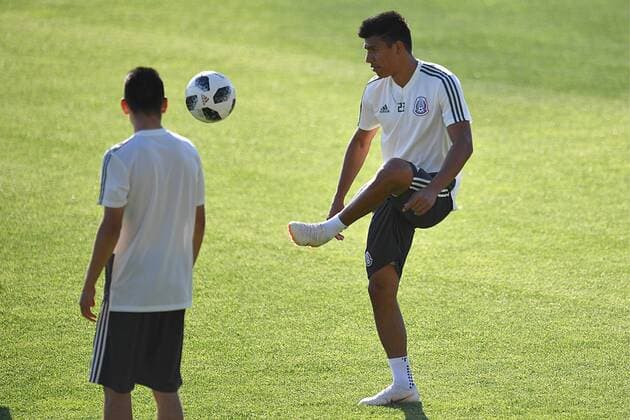 YEKATERINBURG, RUSSIA â€“ JUNE 26, 2018: Midfielder Jesus Gallardo (R) of the Mexican men s national football team training for their upcoming 2018 FIFA World Cup WM Weltmeisterschaft Fussball Group F match against Sweden at Yekaterinburg Arena Stadium. Donat Sorokin TASS  TS086717