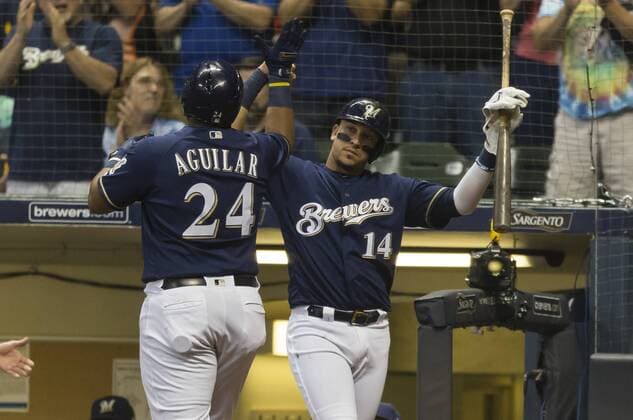June 26, 2018: Milwaukee Brewers Hernan Perez 14 congratulates Jesus Aguilar 24 on his solo home run in the third inning of the Major League Baseball game between the Milwaukee Brewers and the Kansas City Royals at Miller Park in Milwaukee, WI. CSM MLB Baseball Herren USA 2018 Royals vs Brewers JUN 26 - ZUMAc04_ 20180626_zaf_c04_001 Copyright: xJohnxFisherx