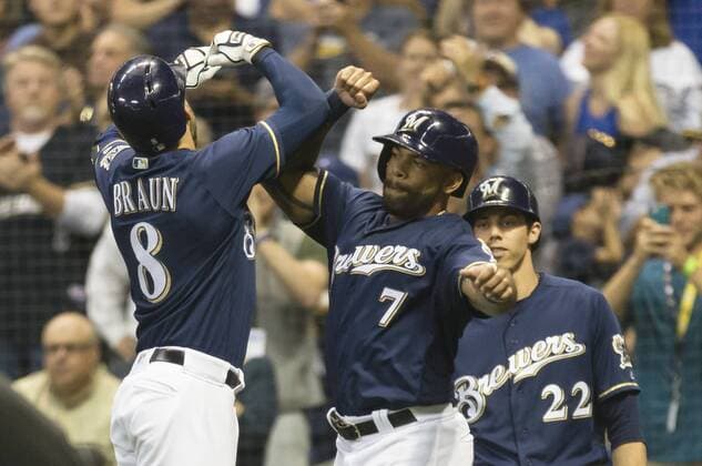 June 26, 2018: Milwaukee Brewers Eric Thames 7 congratulates Ryan Braun 8 on a two run homer in the 5th inning of the Major League Baseball game between the Milwaukee Brewers and the Kansas City Royals at Miller Park in Milwaukee, WI. CSM MLB Baseball Herren USA 2018 Royals vs Brewers JUN 26 - ZUMAc04_ 20180626_zaf_c04_004 Copyright: xJohnxFisherx
