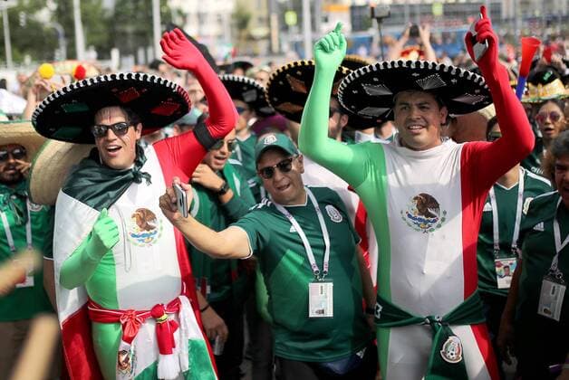 YEKATERINBURG, RUSSIA - JUNE 27, 2018: Supporters of Team Mexico seen in a street ahead of a 2018 FIFA World Cup WM Weltmeisterschaft Fussball Group F match between Mexico and Sweden. Sergei Bobylev TASS  TS0869E8